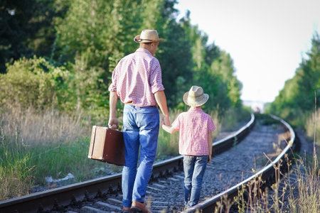 father and son cowboys concept happiness togetherの写真素材