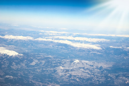 Beautiful earth and sea from a window airplane backgroundの写真素材