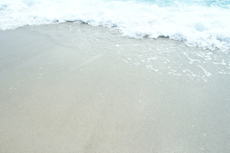 Beautiful sea and sand on the shore vacation travel backgroundの写真素材