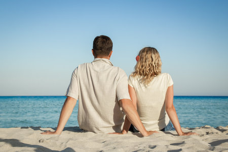 happy loving couple by the sea in the natureの写真素材