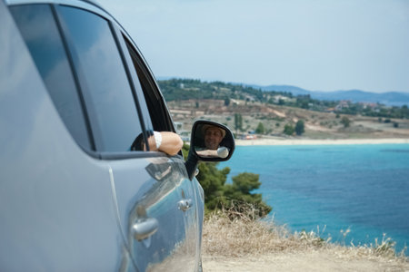 happy guy in auto sea backgroundの写真素材