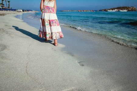 beautiful footprints with feet on the sand backgroundの写真素材
