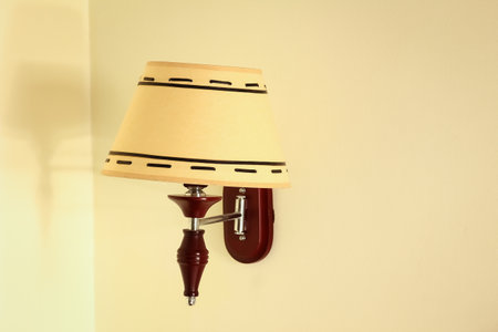 Stylishly beautiful lamp lamp with shadow on backgroundの写真素材
