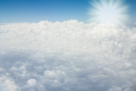 earth and clouds with an airplane on nature in the sky backgroundの写真素材
