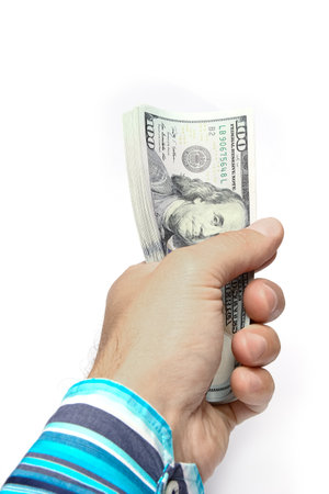 Money dollars in the hands on a white backgroundの写真素材
