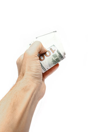 Money dollars in the hands on a white backgroundの写真素材