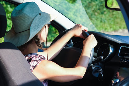 driver driving a car on the roadの写真素材