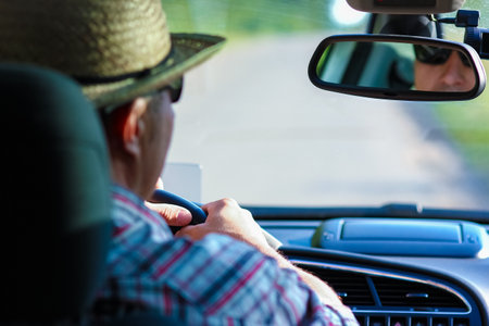 driver driving a car on the roadの写真素材
