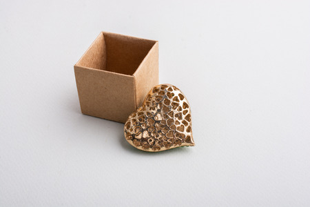 Love concept with heart shaped icon and a box  in view