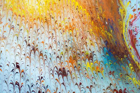 abstract marbling art patterns in paint as background