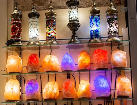 Organic Himalayan salt lamps illuminate in multi colors