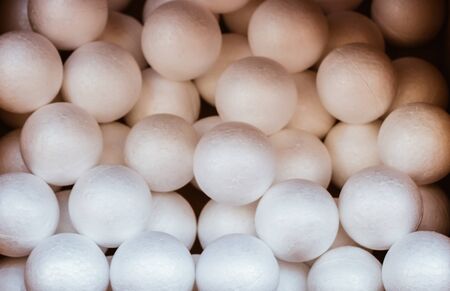 Dozens of styrofoam balls in the viewの写真素材
