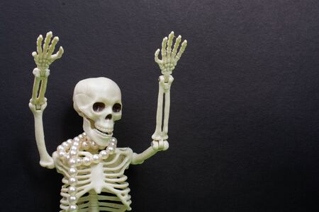 Skeleton wih hands up to scare.  Death conceptの写真素材