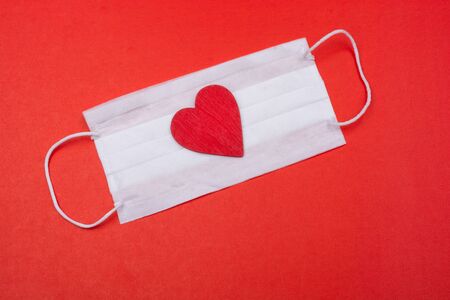 Heart and medical mask as  Healthcare concept. Protection from coronavirus