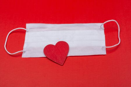 Heart and medical mask as  Healthcare concept. Protection from coronavirusの写真素材