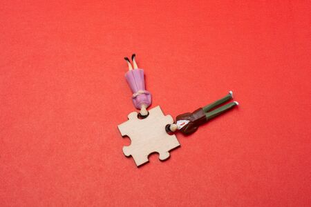 Puzzle piece as union and cooperation  thinking question, idea concept