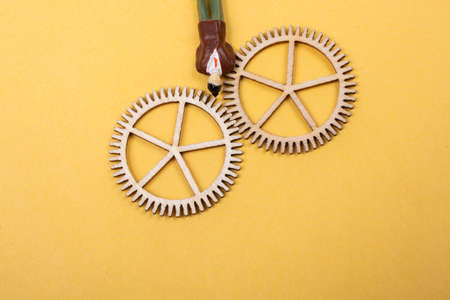 Industrial composition. Man with cogwheel gears