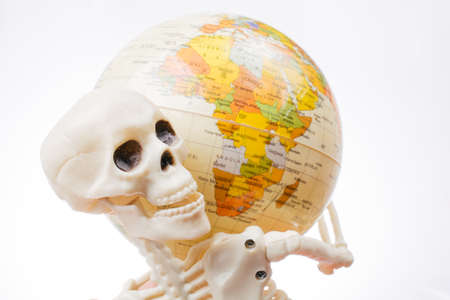 the earth in a skeleton handの写真素材