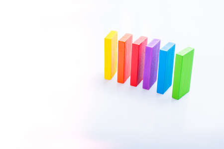 Colorful Domino Blocks placed on a white background
