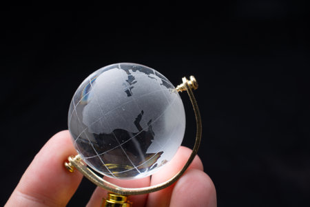 Glass globe for environment and conservation. Global business or education  concepts