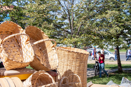 Empty wicker baskets are for sale in a market placeの写真素材