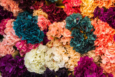 Floral art made of colorful artificial flowers in viewの写真素材