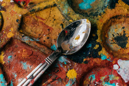 Paint stained teaspoon cuisine cutlery kitchen household kitchenwareの写真素材