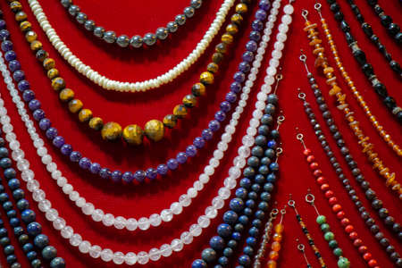 handcrafted necklace. String of beads in various colors. Colorful beads necklaces.の写真素材