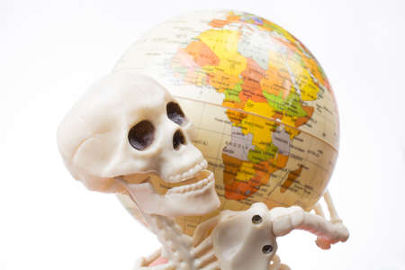 the earth in a skeleton handの写真素材