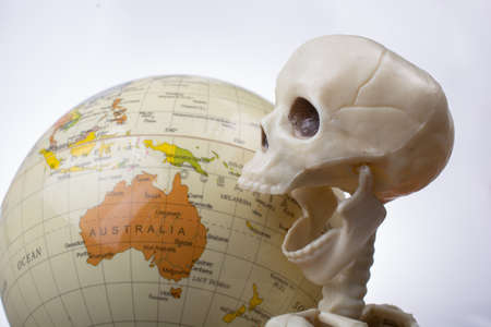 the earth in a skeleton handの写真素材