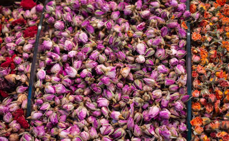 Background of dried rose buds as herbal teaの写真素材