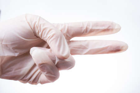 Hand close-up in rubber gloves. medical gloveの写真素材