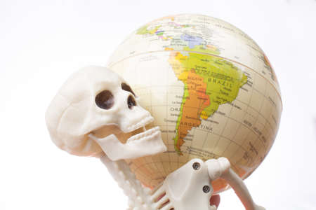 the earth in a skeleton handの写真素材