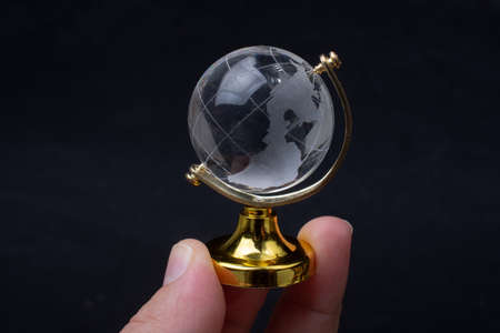 Glass globe for environment and conservation. Global business or education  conceptsの写真素材