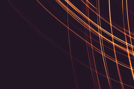 Painting with light at night, bright orange line shape on a black backgroud. The light source moves...