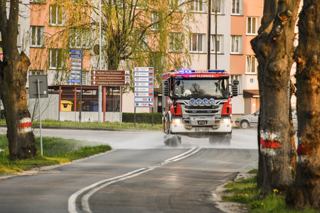 Bystrzyca Klodzka, Poland - April, 24,2020: Sanitizing the city by fire department, disinfecting...