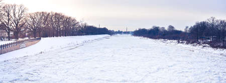 Ice floe in winter across the width of the Odra River in Wroclaw. The ice-bound river makes it impossible to navigate.の写真素材