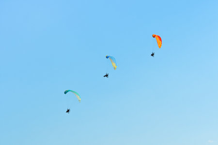 Leszno, Poland - June, 19, 2021: The Flying Dragons Team - Moto paragliding demonstration group...