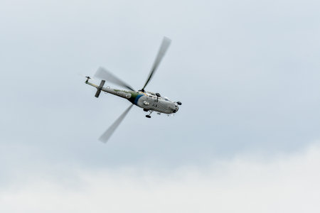 Ostrava, Czech Republic - September, 18, 2021: Helicopter W-3A SOKOL of Czech Helicopter W-3A SOKOL of Czech Air Force during NATO Days 2021 show in Ostrava with rescue crew roping up.のeditorial素材