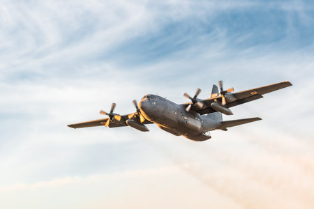 Leszno, Poland - June, 17, 2022: Antidotum Airshow Leszno, Lockheed C-130 Hercules, turboprop powered military transport aircraft. The pilot presents the plane by performing maneuvers in the air.のeditorial素材