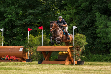Strzegom Horse Trials, Morawa, Poland - June, 25, 2022: Italian Matteo Orlandi on horse Quality In Time, on the Cross Country route during the competition.のeditorial素材