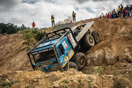 Kunstat, Czech Republic - August 14, 2022: Unidentified truck at difficult muddy terrain during truck trial National championship show of Czech Republic 2022 in Kunstat.のeditorial素材