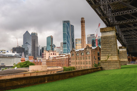 Sydney, Australia - March 03, 2023: View of tall skyscrapers and urban buildings from the walking...