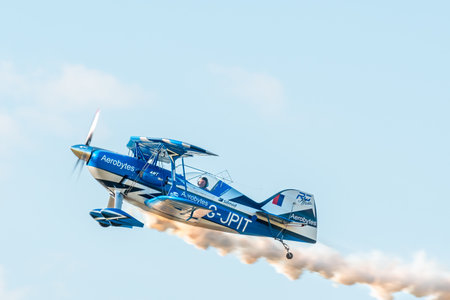 Leszno, Poland - June, 22, 2024: Antidote Airshow Leszno, Rich Goodwin in the Jet Pitts plane. The pilot performs acrobatics in the air in a biplane propeller plane with a jet engine.のeditorial素材