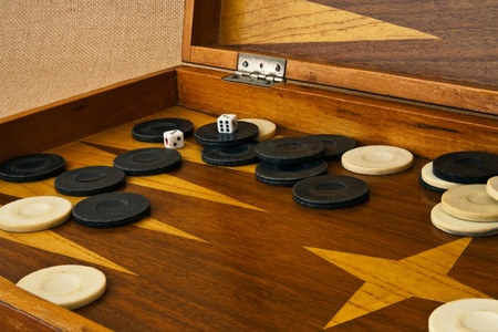 Ramshackle board backgammon dice, white and black checkers