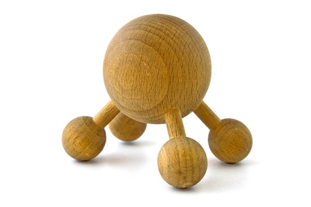 Wooden massage tool isolated on a white backgroundの写真素材