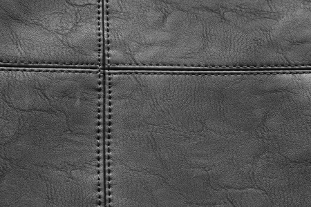 Detail of black leather with stitching in closeupの写真素材