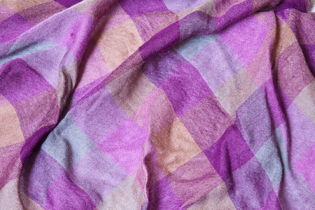 Creasing machine woven textile fabric in yellow - purple and blue plaid