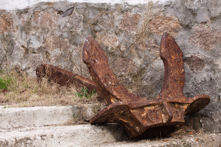 Old rusty anchor of a shipの写真素材
