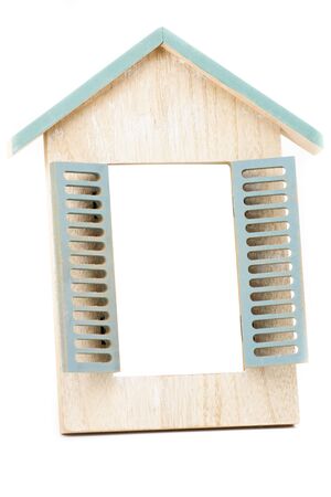 A wooden vintage photo frame has a white backgroundの写真素材